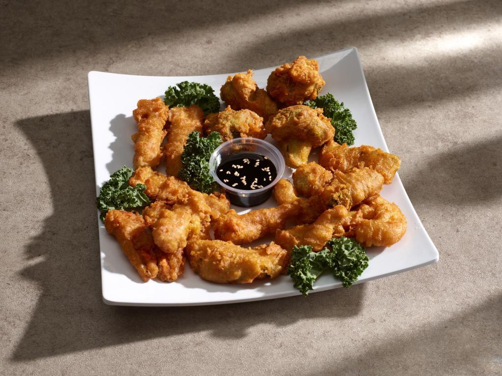 A13. Grand Tempura · Broccoli, pumpkin, zucchini, and soy shrimp, lightly battered and deep fried and served with tempura sauce.