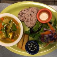 D9. Red Curry Dinner Combo · Hot exotic red curry paste with coconut milk, basil, bell pepper, onions, carrots, bamboo sh...