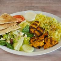 Chicken Kabob Platter · Charbroiled chicken breast tenderloin marinated in garlic, lemon juice, herbs and spices. Se...