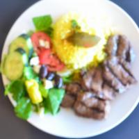 Shish Kabob Plate · Lean cuts of marinated charbroiled cubes of tender beef. Served with basmati yellow rice, Gr...