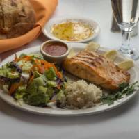 62. Salmon ( Kosher ) · Broiled salmon. Char grilled salmon served with mixed greens. home made bread