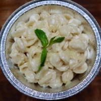 Mac and Manchego Cheese · Truffle oil.
