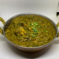 Chicken Saag · Boneless tender meat cooked with creamy spinach, garlic, ginger, onion, tomato and freshly r...