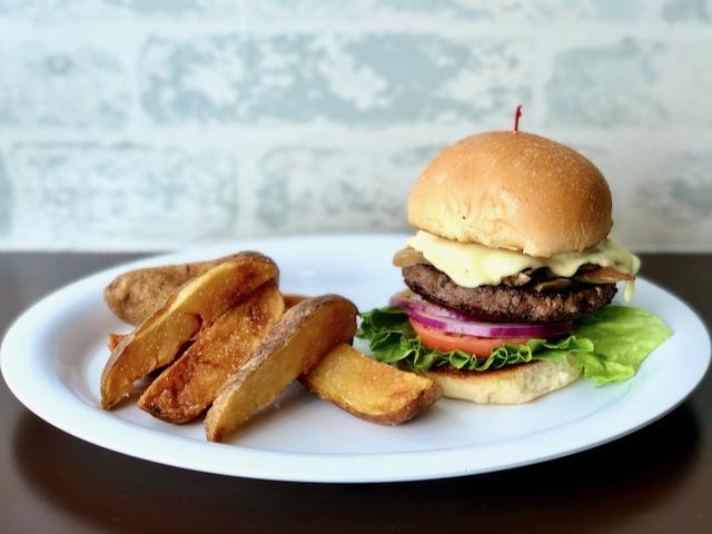 Roasters Burger · 1/2 lb Burger topped with Sautéed Mushrooms, Onions and Melted Swiss Cheese on a Grilled Kaiser Bun. Served with Homemade Steak Fries