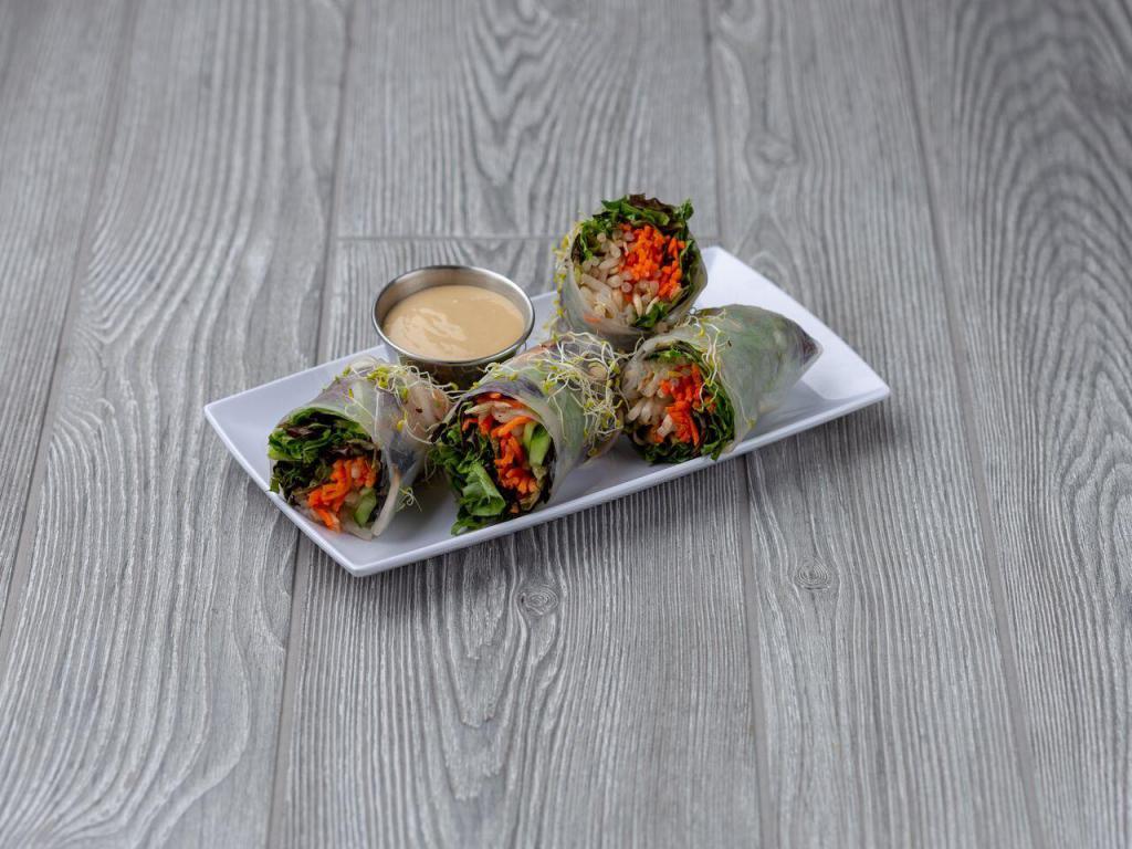 Vietnamese Spring Roll · Two spring rolls filled with bean sprouts, red leaf lettuce, romaine, shredded carrots, cucumber, cilantro, basil and our thai peanut dressing all rolled up in a rice wrapper.