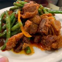 HA4 Pad Prik Khing Moo Krob · Sautéed crispy pork with string beans in house spicy sauce.