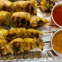 A1. Satay Appetizer · 4 pieces. Chicken or beef marinated with herbs and coconut milk then grilled and served with...
