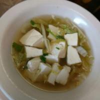 S4. Tofu Soup · Fresh soft tofu with mixed vegetables in a mild clear soup.