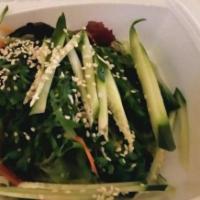 SL2. Seaweed Salad · Lettuce and fresh vegetables topped with seaweed and sesame seeds.
