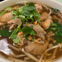 NS6. Duck Noodle Soup · Duck stew, Chinese broccoli and bean sprouts.