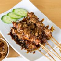 5 Piece Sate · Flame-grilled marinated chicken skewer with homemade peanut dipping sauce on the side.