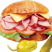 Ham and Cheese on Croissant · Served with ham, lettuce, tomatoes, cheese mayonnaise, on side onions, dill pickle, pepperon...