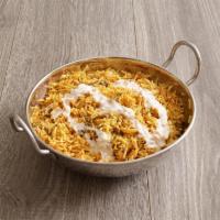 Lamb Biryani · Fragrant Basmati rice layered with lamb that have been cooked in a mixture of spices.