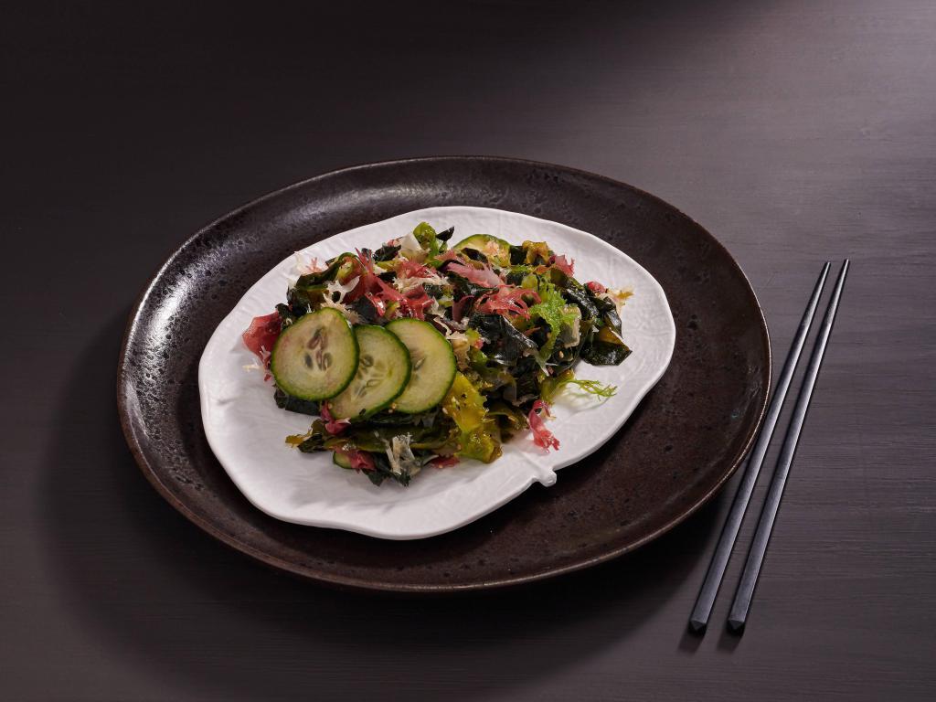Seaweed and Cucumber Salad · Wakame, kombu, tosaka and yuzu vinaigrette. Vegan and vegetarian.