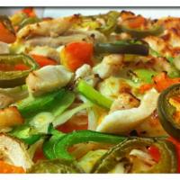 Spicy Chicken Pizza · Chicken breast, green peppers, onions, tomatoes and jalapenos.