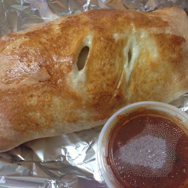 Pepperoni Roll · Pepperoni, onions, green peppers, mozzarella and marinara sauce. Includes mozzarella cheese and marinara sauce on the side.