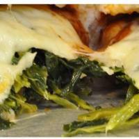 Spinach Calzone · Includes mozzarella cheese and marinara sauce on the side.
