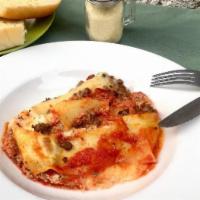 Lasagna (Meat) · Marinara sauce. Served with garlic bread.