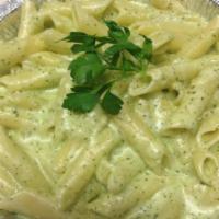 Penne Basil Pesto Cream · Cream sauce, basil pesto and Parmesan cheese. Served with garlic bread.