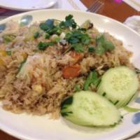 70. Spicy Fried Rice · Fried rice with chili, onions, bell pepper and sweet basil.