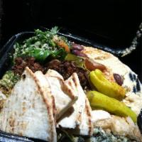 Vegetarian Combo · Hummus, tabbouleh, falafel and spanakopita. Served with rice, Greek salad, pita bread and tz...