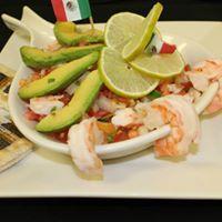 Shrimp Ceviche · 16 Tiger shrimp marinated in lime juice and spices mixed with pico de gallo and decorated wi...