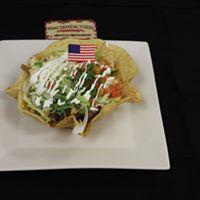 L9. Taco Salad Lunch · Crispy flour tortilla shell filled with chicken or ground beef. Topped with lettuce, pico de gallo, shredded cheese, cilantro and sour cream.