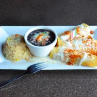 Shrimp Enchiladas · 3 enchiladas with sautéed shrimp and pico de gallo. Served with rice, black beans and salad....