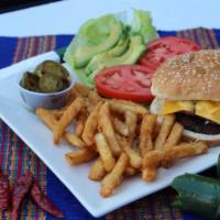 Mexican Burger · A bacon cheeseburger with marinated ground beef. Accompanied by fries. Lettuce, avocado slic...