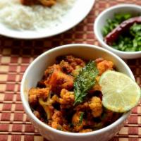Aloo Gobi · Potatoes and cauliflower cooked in Indian style onion and tomato gravy.