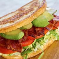 BLTA Sandwich · Applewood smoked bacon, lettuce blend, tomatoes, avocado, garlic aioli and griddled sourdough.