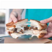 The Melt Down Sandwich · Grilled chicken breast, provolone, sauteed mushrooms and grilled red onions.