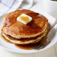 Buttermilk Pancakes · With powdered sugar and maple syrup.
