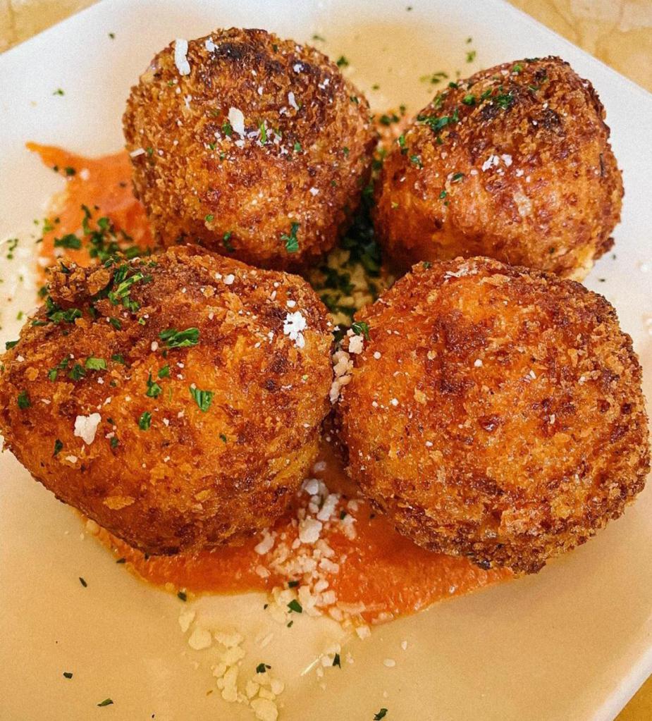 Loaded Lobster Mac N Cheese Balls · 4 lobster mac n cheese balls , jalapeños.& bacon with special sauce onside