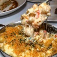 Loaded Lobster Mac & Cheese Fries · French fries topped with mac & Cheese loaded with crispy bacon, jalapeno and lobster.