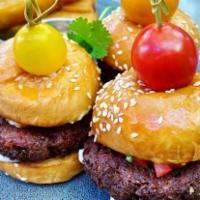 Steak Sliders · 2 slider Comes with peppers, onions and provolone cheese.