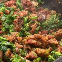 Sauteed Broccoli Rabe and Sausage · Sauteed in a garlic olive oil.
