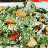 Caesar Salad · Romaine lettuce, homemade croutons and classic Caesar dressing.