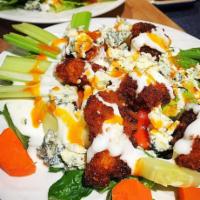 Buffalo Chicken Salad · Mixed greens, crispy buffalo chicken, tomato, celery, carrots and bleu cheese dressing.