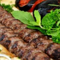 5. Shami · Seasoned ground beef, broiled on skewers over charcoal. Served with fresh homemade bread.