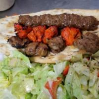 8. Deluxe Kabob · 1 skewer each of chicken, shami, lamb kabob, marinated in special herbs, spices and broiled ...