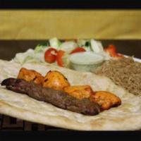 10. Combo Kabob · On skewer each of chicken and shami or lamb and chicken. Served with fresh homemade bread.