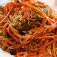 1. Qaubili Palau · Tender chunks of lamb under a heaping portion of seasoned rice topped with sweet carrot stri...