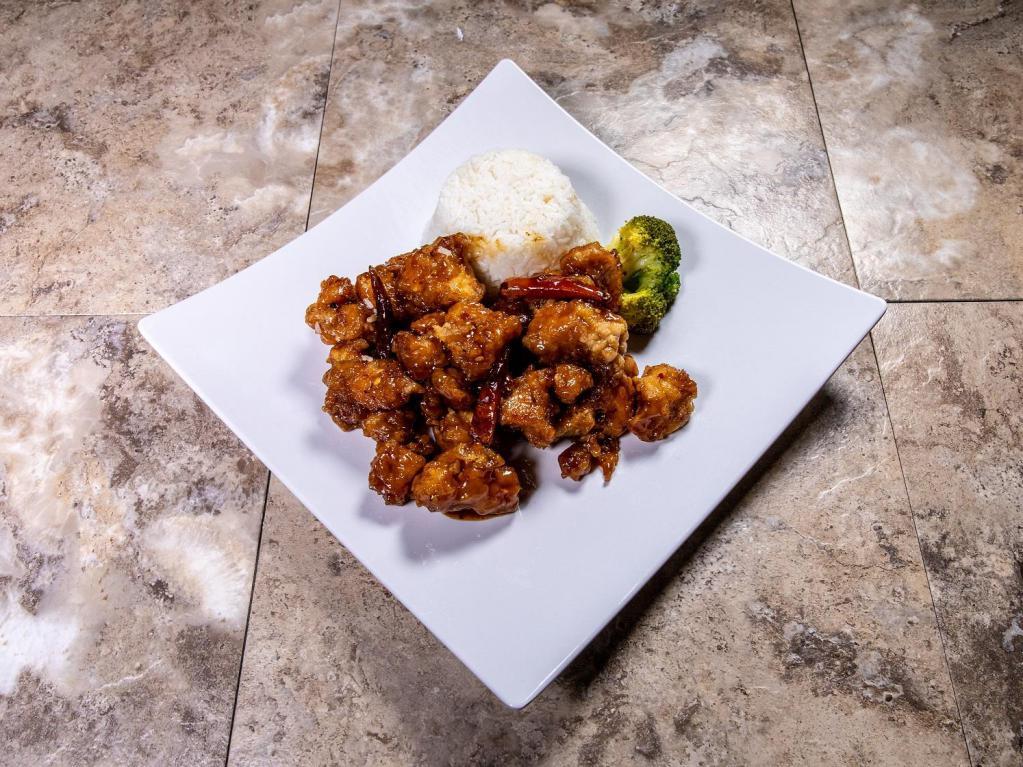 DC5. General Tso's Chicken · Served with egg roll, fried rice or steamed rice. White meat chicken. Spicy.