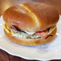 Black Forest Ham Breakfast Sandwich · Smith Brothers egg, honey cured Black Forest ham, mozzarella cheese and tomatoes. Brioche br...