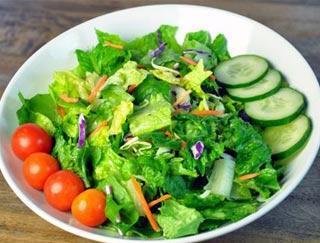 Pearl Banquet Special Green Salad · A crunchy medley of fresh greens combined with lentils napped in tangy dressing.