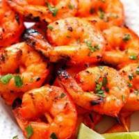 Shrimp Tandoori · Shrimps are marinated in South Indian masala and cooked from in tandoor.