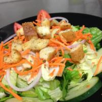 Garden Fresh Salad · Romaine lettuce topped with carrots, croutons, red onion, tomatoes, and cucumbers. Served wi...