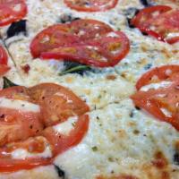 Margherita Thin Crust Pizza · Olive oil, tomatoes, fresh basil and mozzarella cheese.