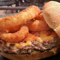 The Kick 'n' Crunch Burger · Our tangy Southwestern sauce delivers the kick and our giant hand-battered onion rings and f...